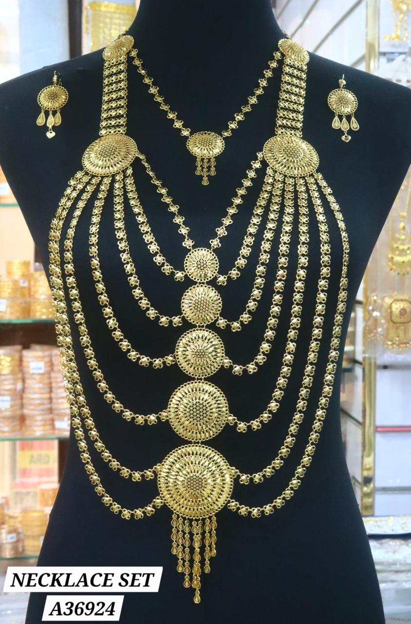 Parure bijoux dorée 5 pièces collier entrelacé et sautoir cascade
