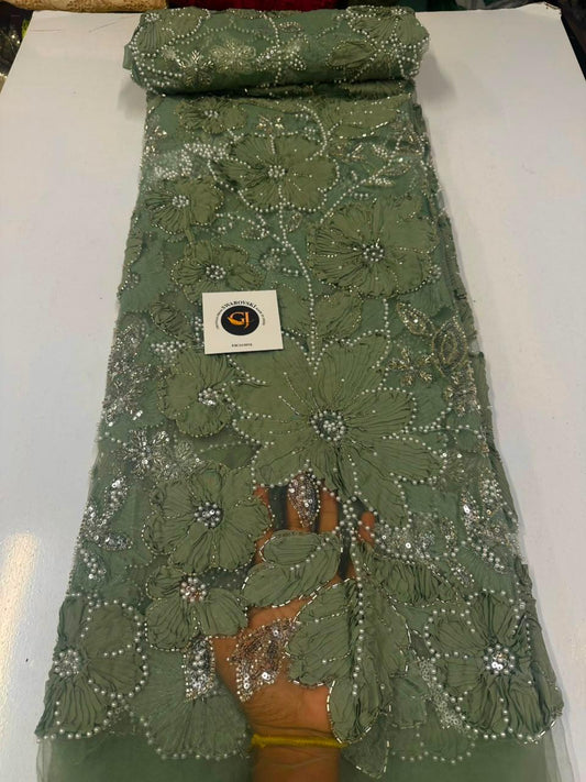 Tissu dentelle guipure marron chocolat motifs grandes fleurs et feuilles ajournées bord festonné