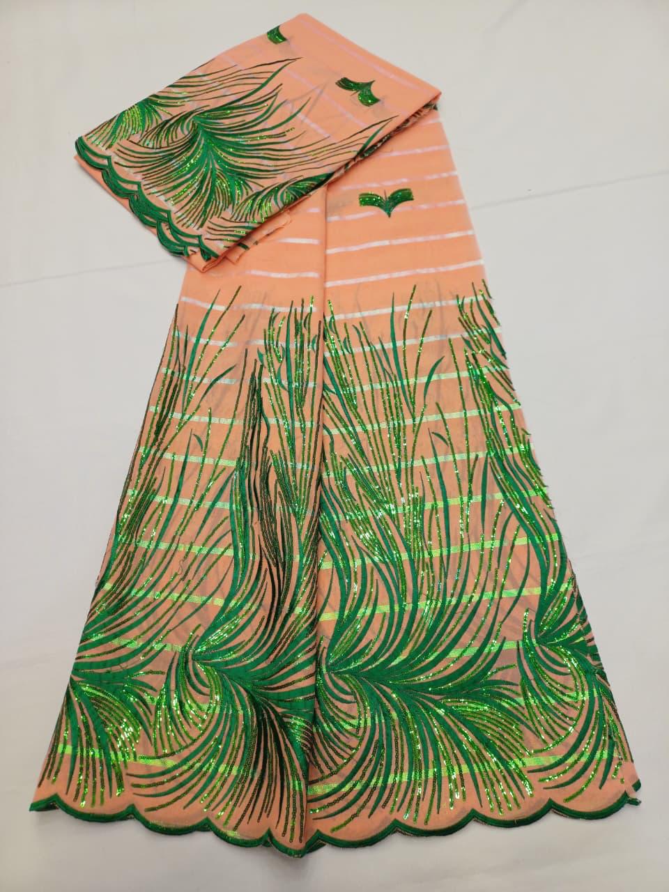 Tissu Salouva vert citron avec motifs rouges scintillants et bordure festonnée