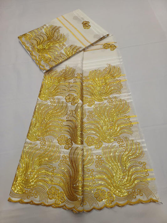 Tissu dentelle africain blanc avec grandes volutes dorées